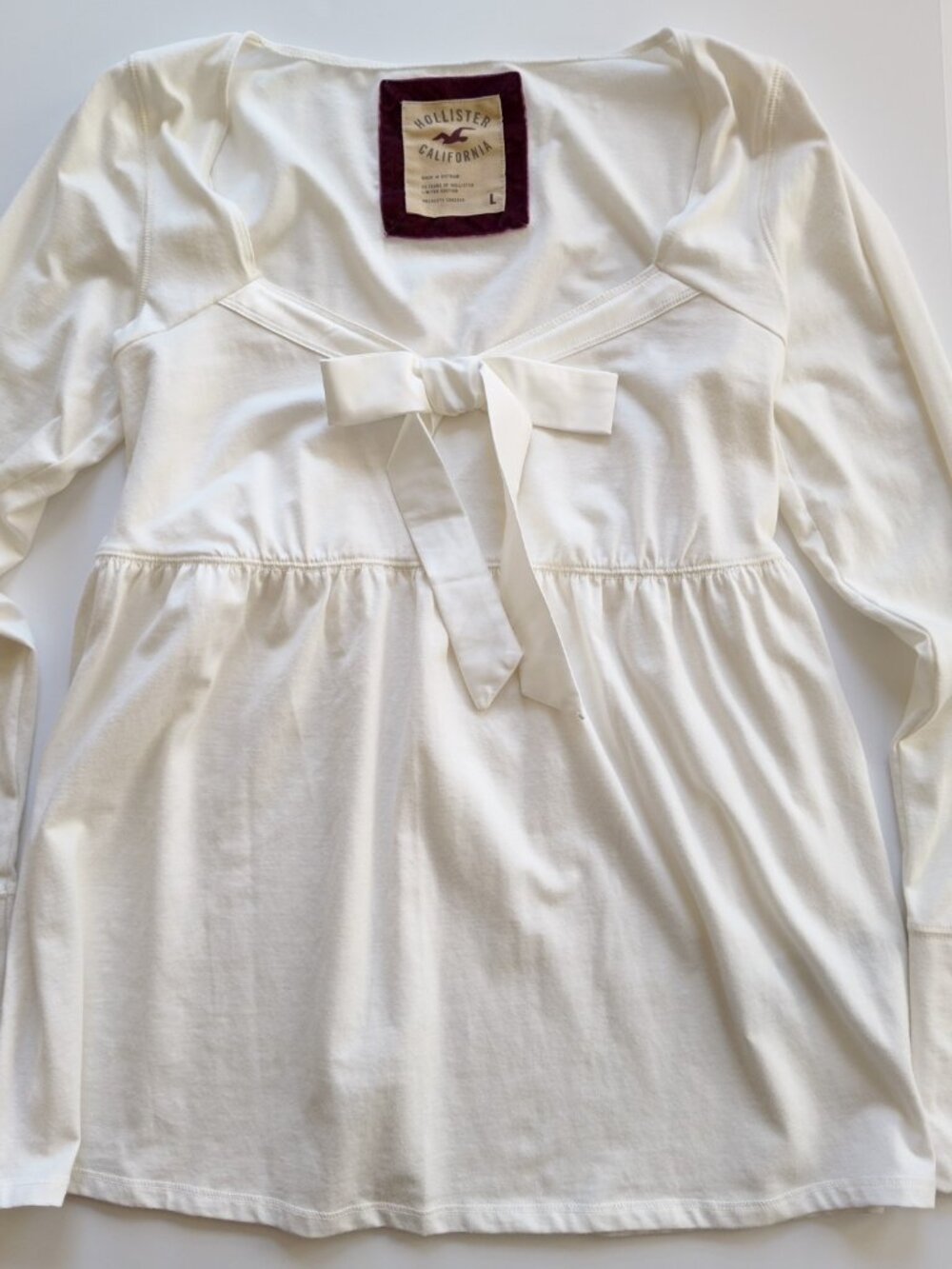 Hollister babydoll top with bow size large womens